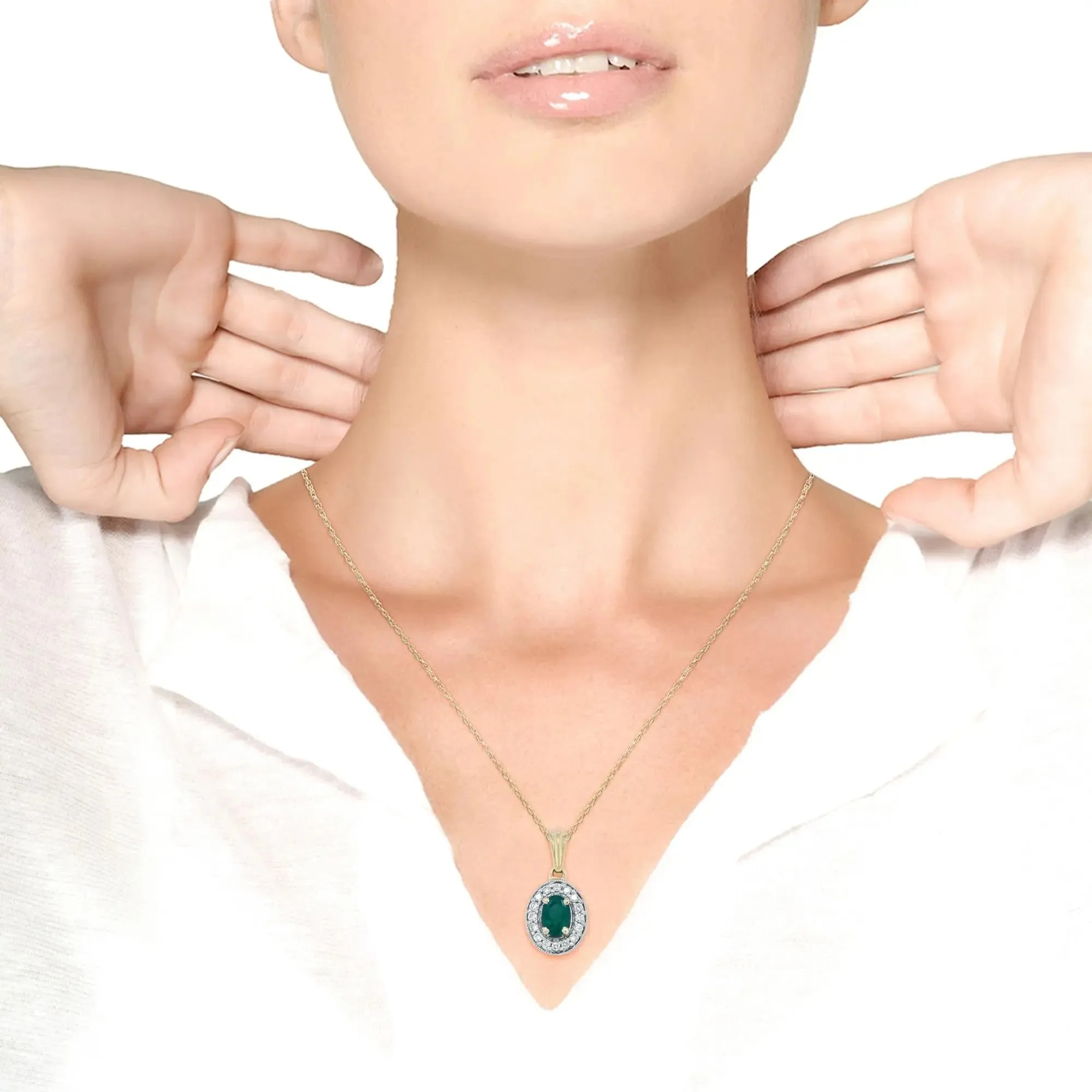 Elegant 14K Yellow Gold Emerald and Diamond Halo Pendant Necklace