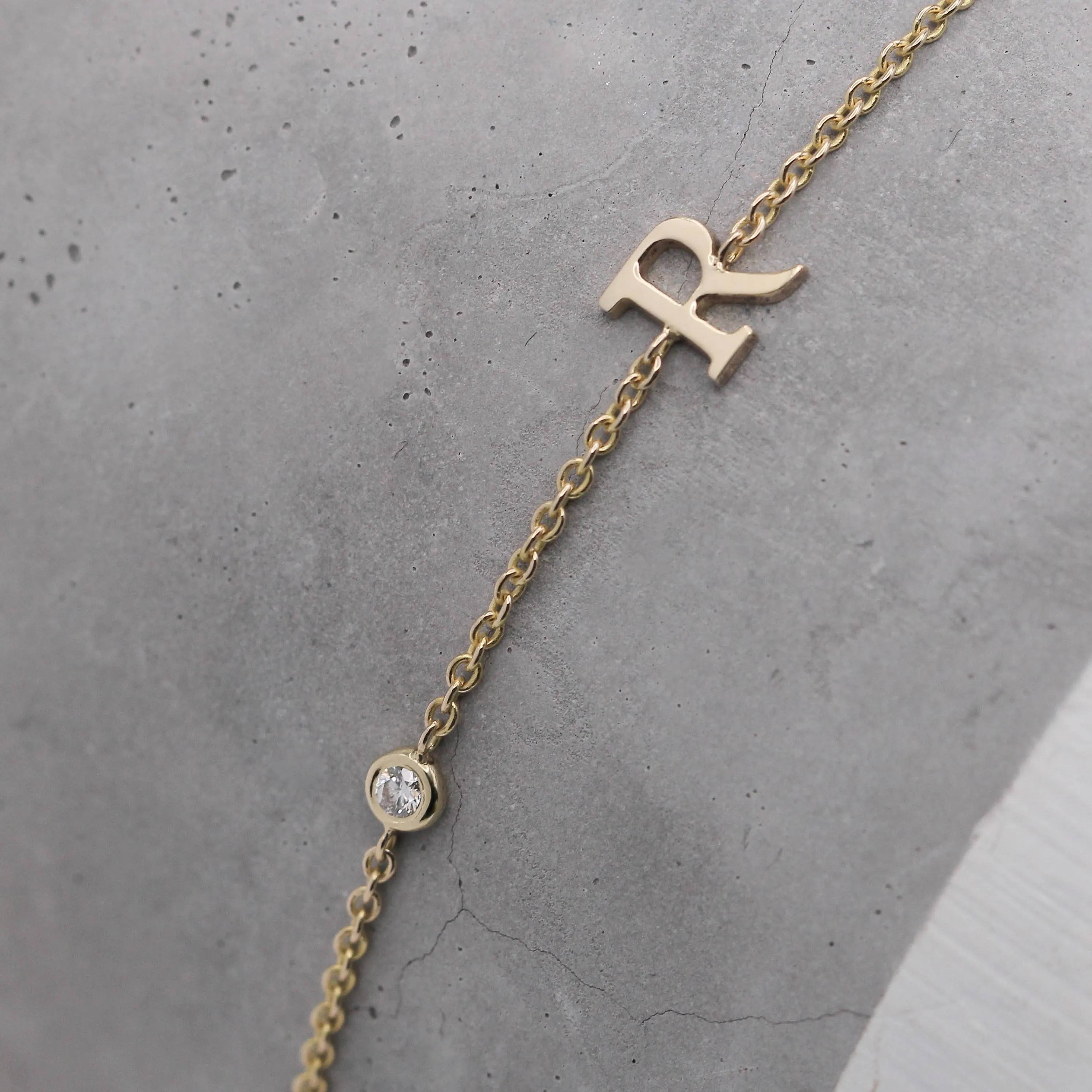 Letter & diamond gold bracelet