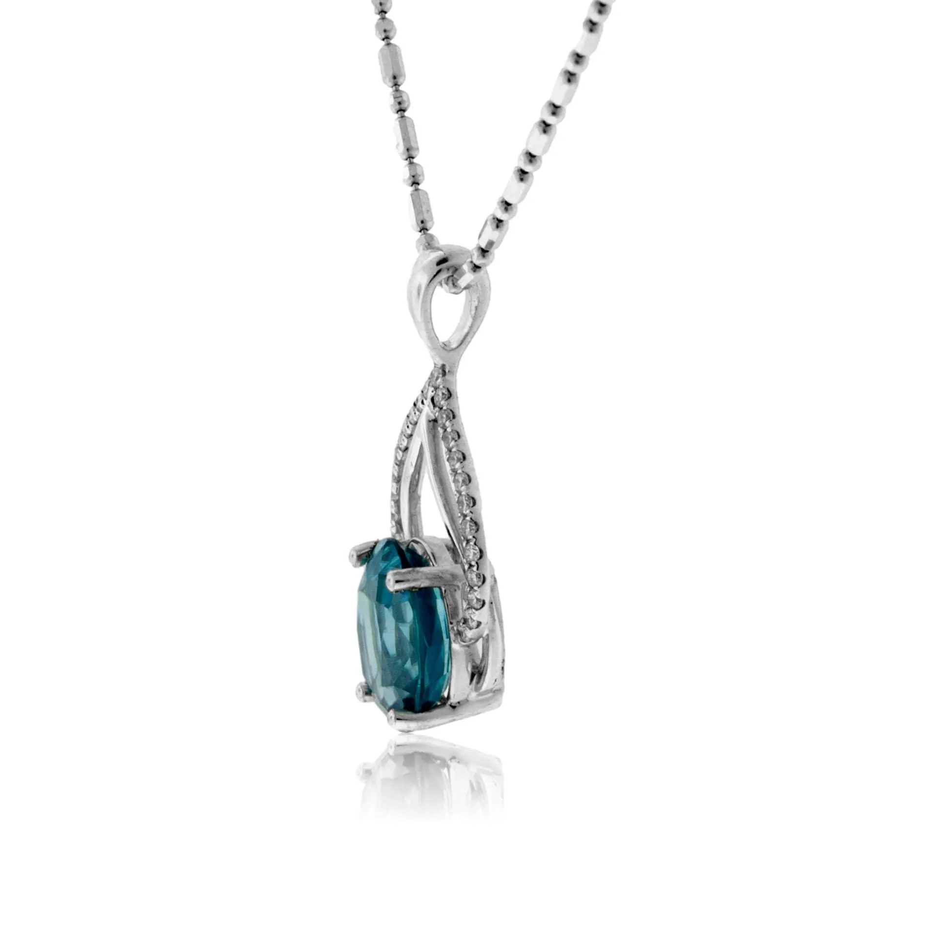 Oval Blue Zircon with Diamond & Gold Outline Pendant