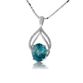 Oval Blue Zircon with Diamond & Gold Outline Pendant