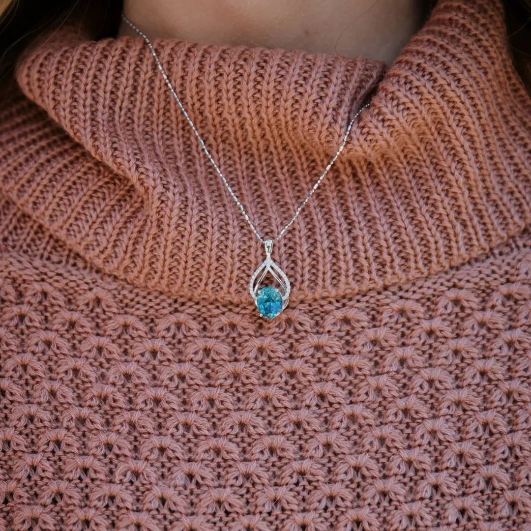 Oval Blue Zircon with Diamond & Gold Outline Pendant