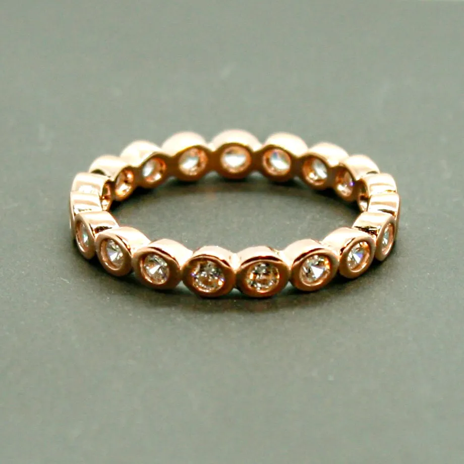 Pave-set ring with large round clear zircon stones