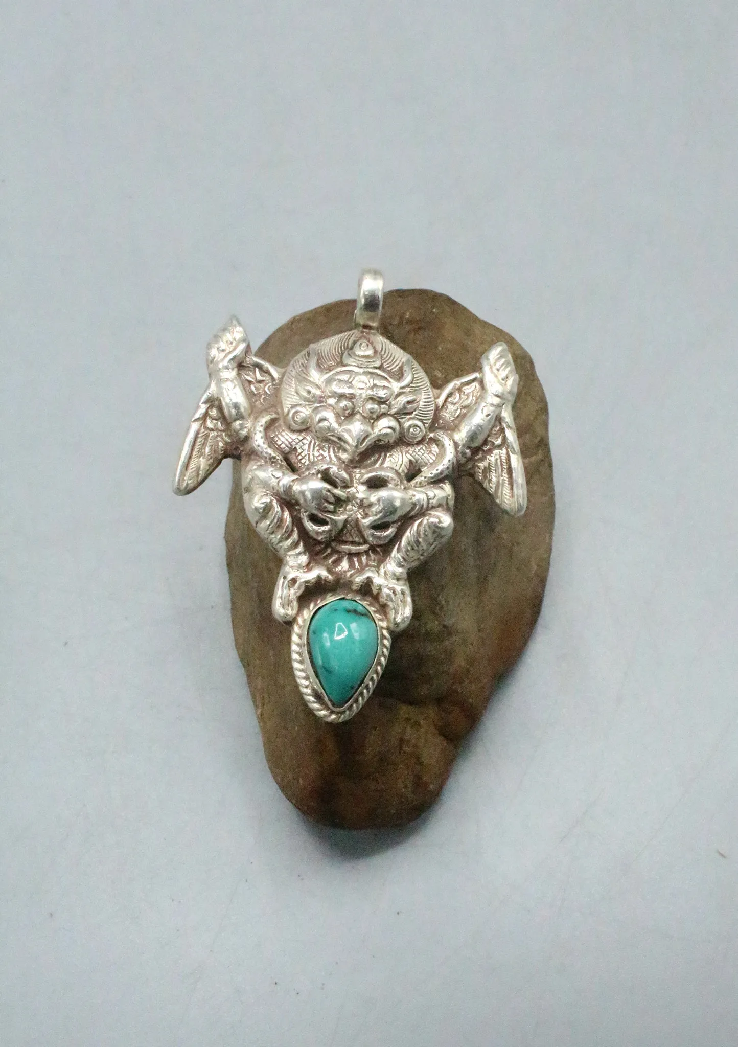 Sterling Silver Garuda Pendant with Inlaid Turquoise Stone